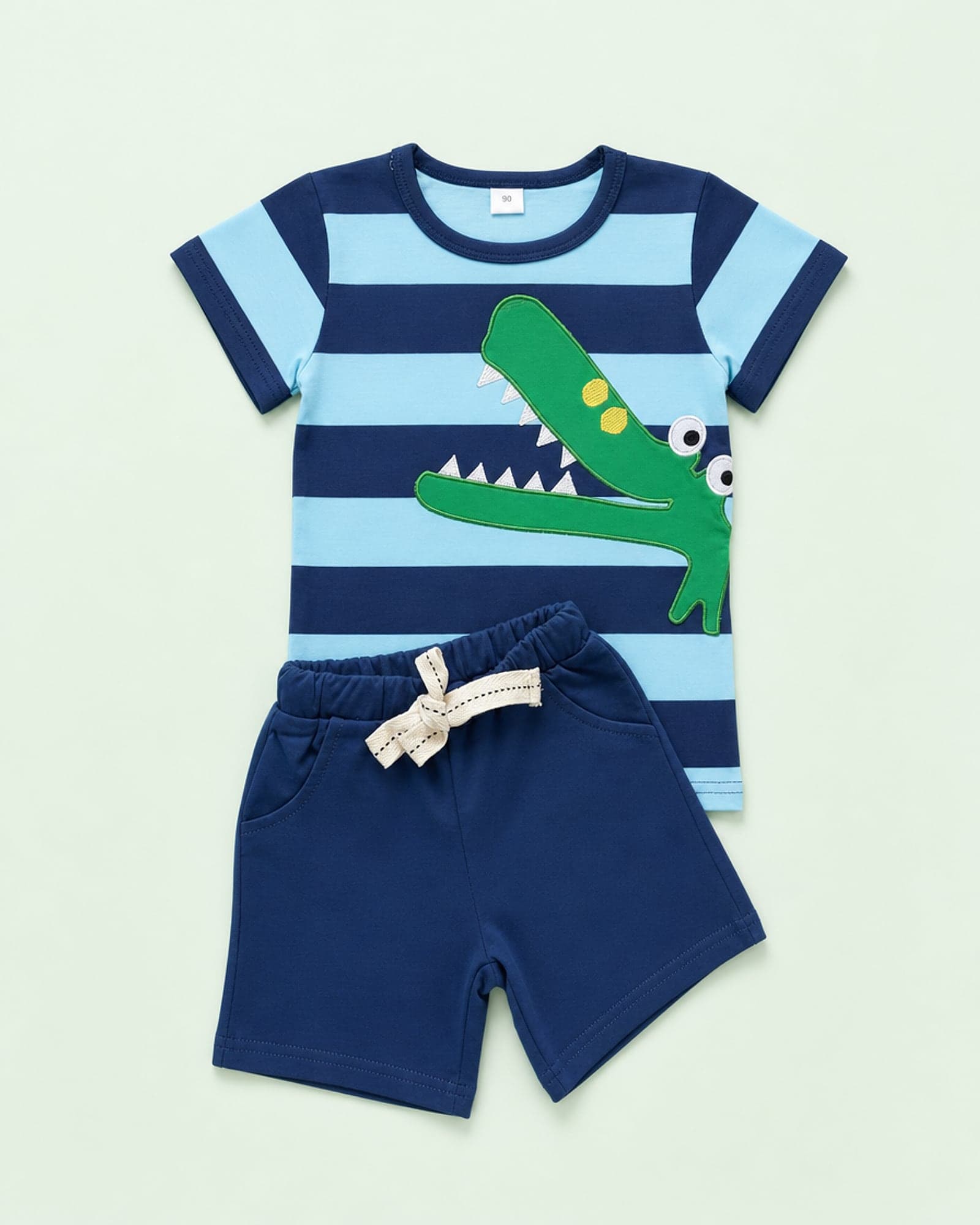 Conjunto crocodilo bordado listrado